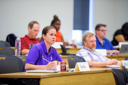 Students listen in classroom 