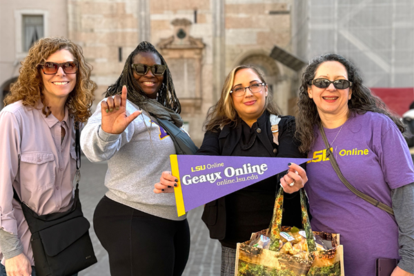 Photo fo the LSU online team visiting Jessica Wilkes in Italy