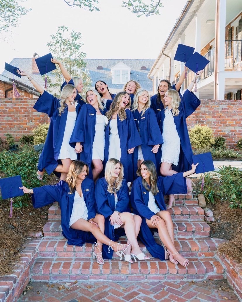 greek members in cap and gowns